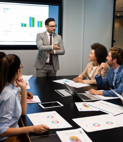 Happy diverse business colleagues meeting, working in modern office Happy multhiethnic business colleagues working in modern office